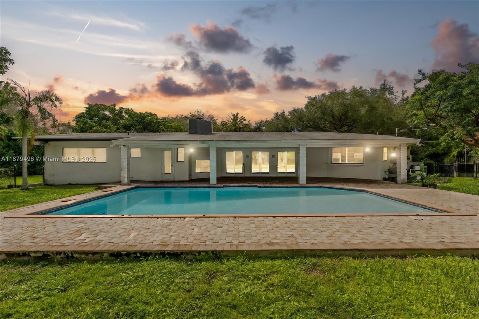 6275 Southwest 123rd Terrace Pinecrest, FL 33156 - Photo 42 of 49 a view of house with a big yard