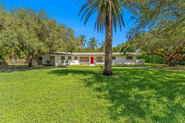 a view of a house with a big yard
