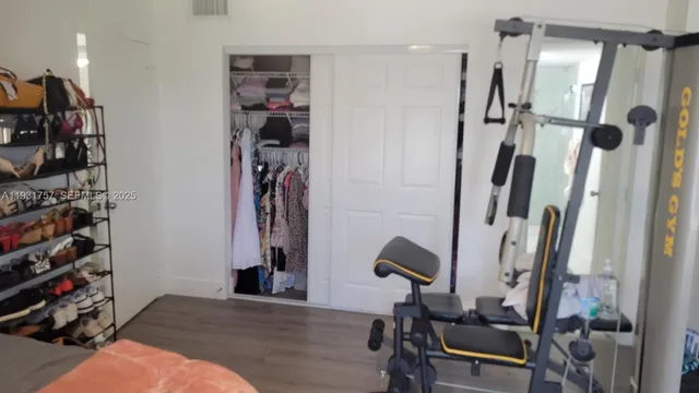 a view of a room with gym equipment