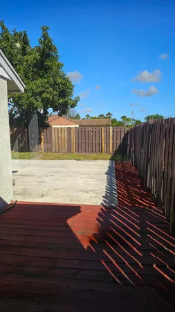 a view of swimming pool with lounge chair