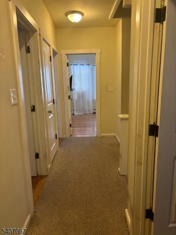 a bedroom with a bed and a television in it