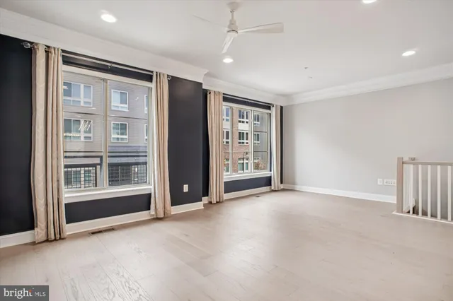 an empty room with windows