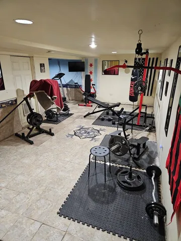 a view of a room with gym equipment