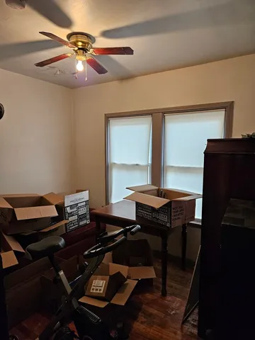 a workspace with furniture and window