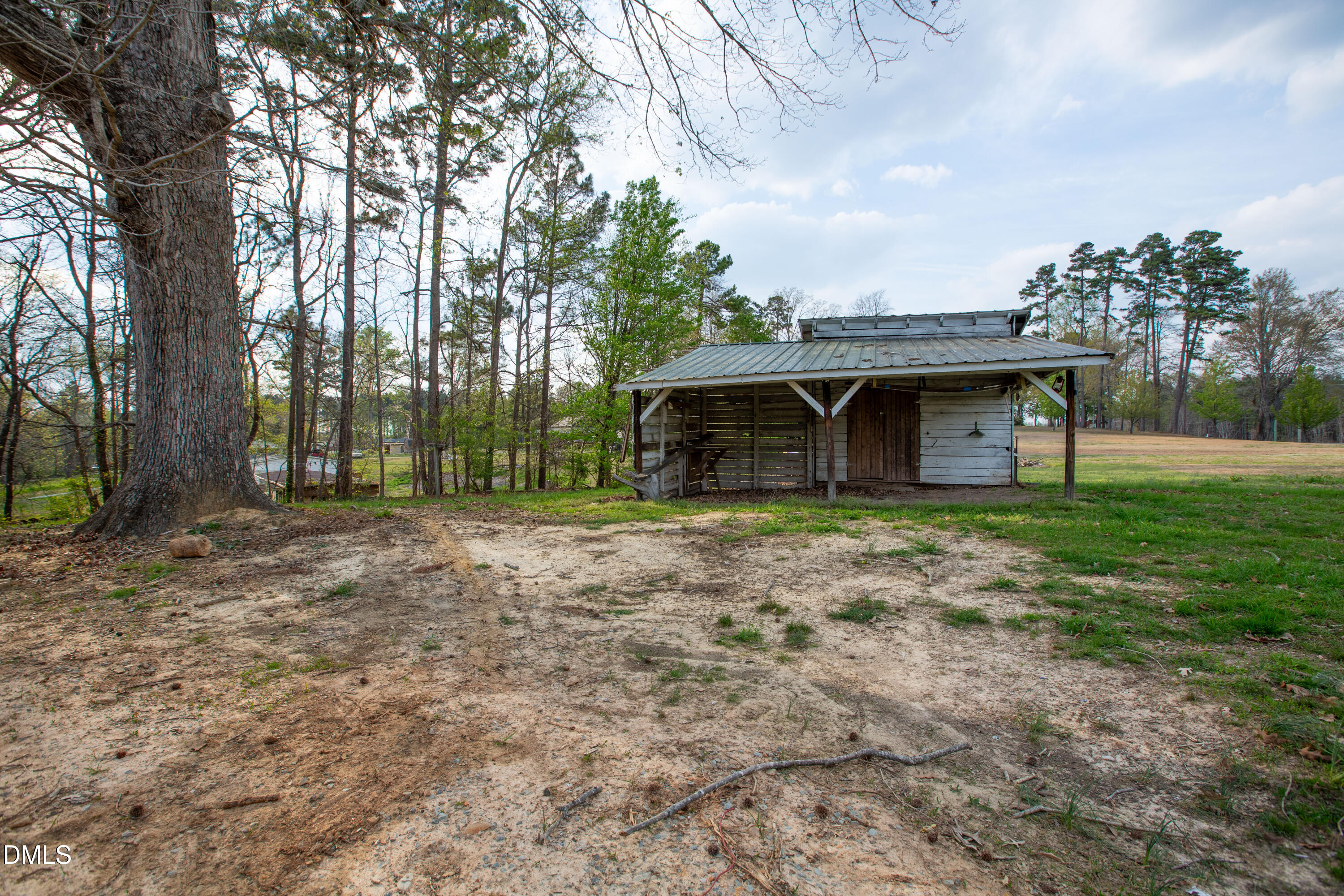 4295 Virgilina Road Roxboro, NC 27574 - Photo 37 of 46 a front view of a house with a garden