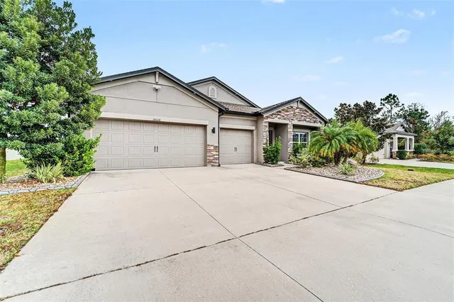 a view of garage yard and tree