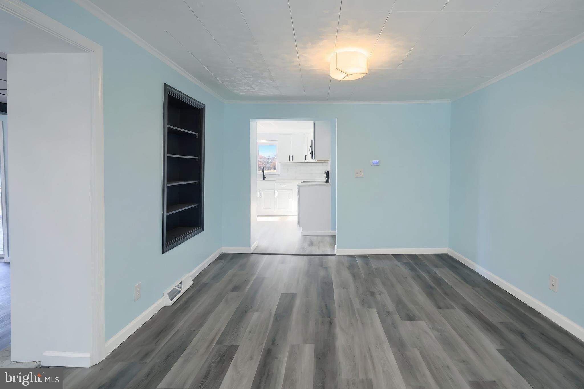 9446 East Springfield Road Seven Valleys, PA 17360 - Photo 13 of 53 Formal dining room with built-in shelves