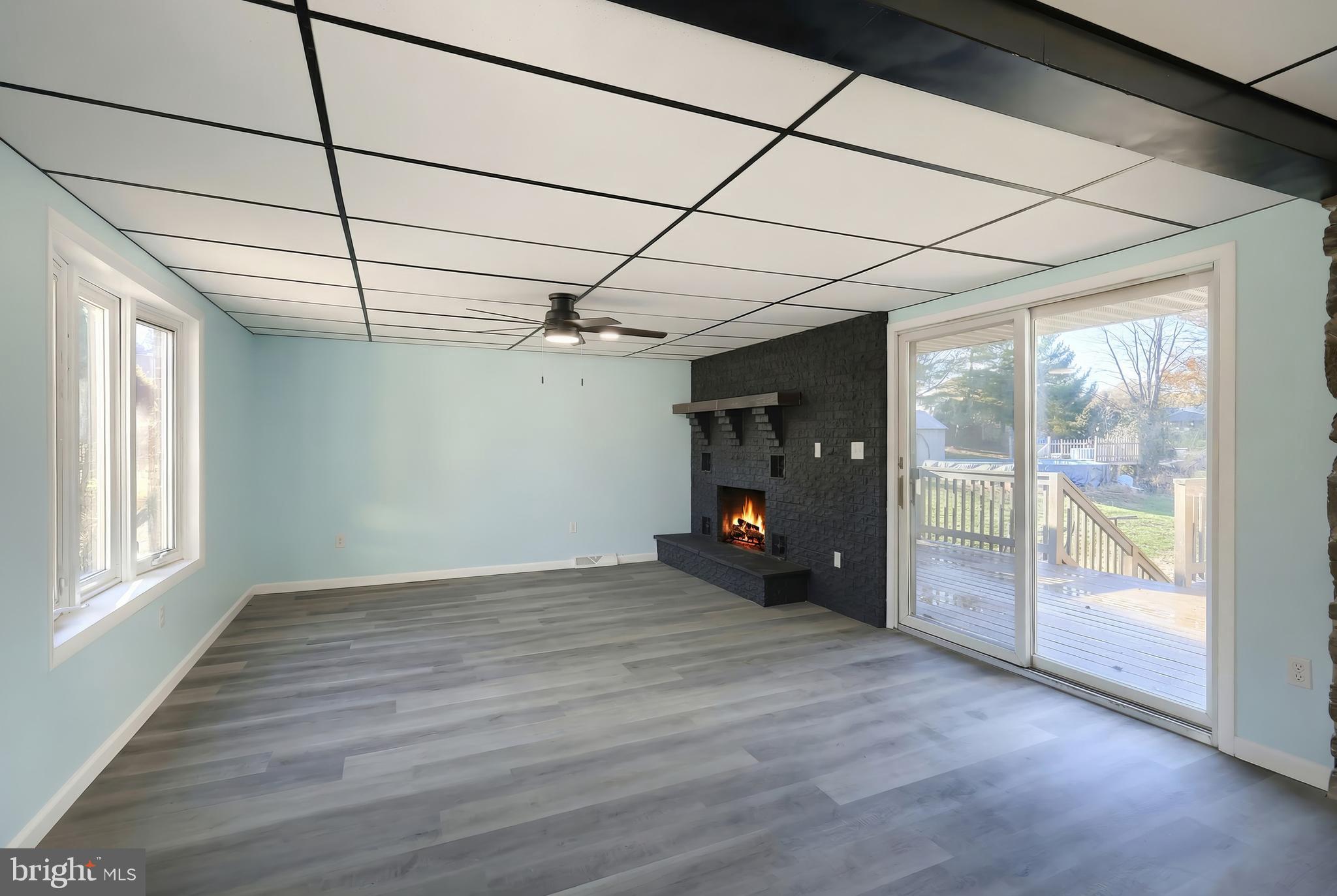 9446 East Springfield Road Seven Valleys, PA 17360 - Photo 18 of 53 Family room with slider to deck