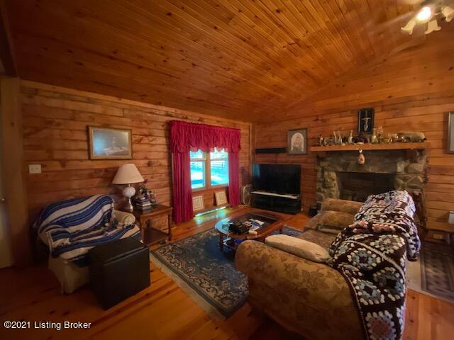 4429 Nelsonville Road Boston, KY 40107 - Photo 4 of 24 Living Room with hardwood floors & stone gas fireplace
