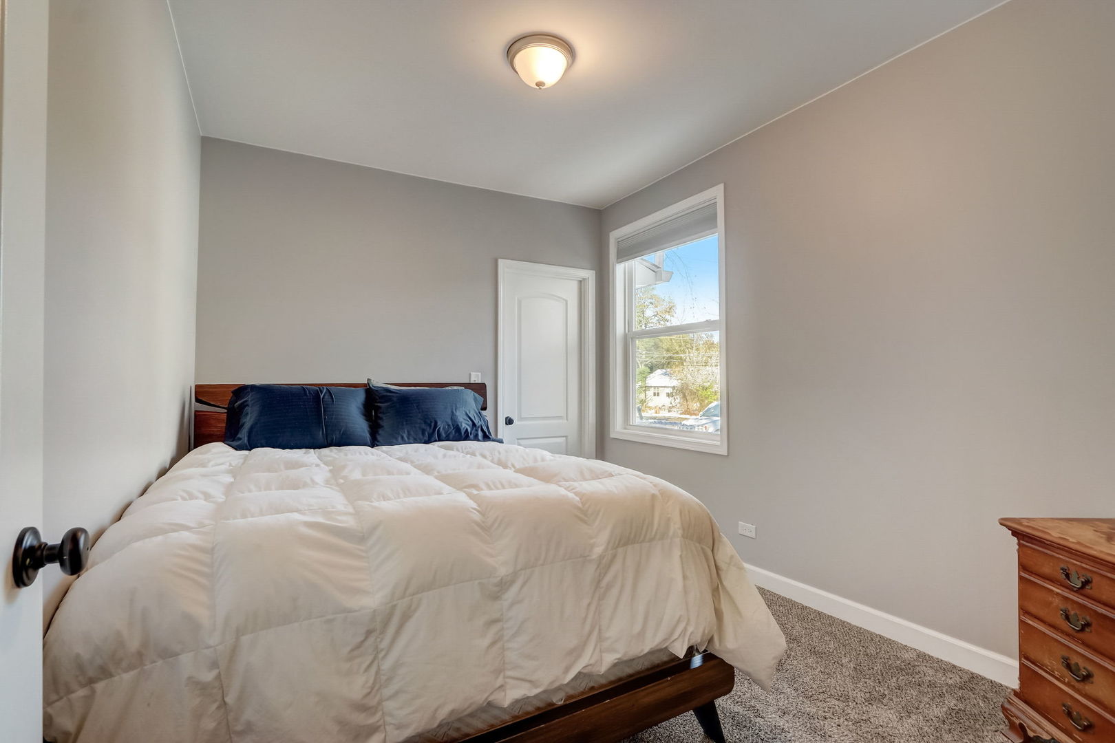 35671 North Wilson Road Ingleside, IL 60041 - Photo 21 of 52 a bedroom with a bed and a window