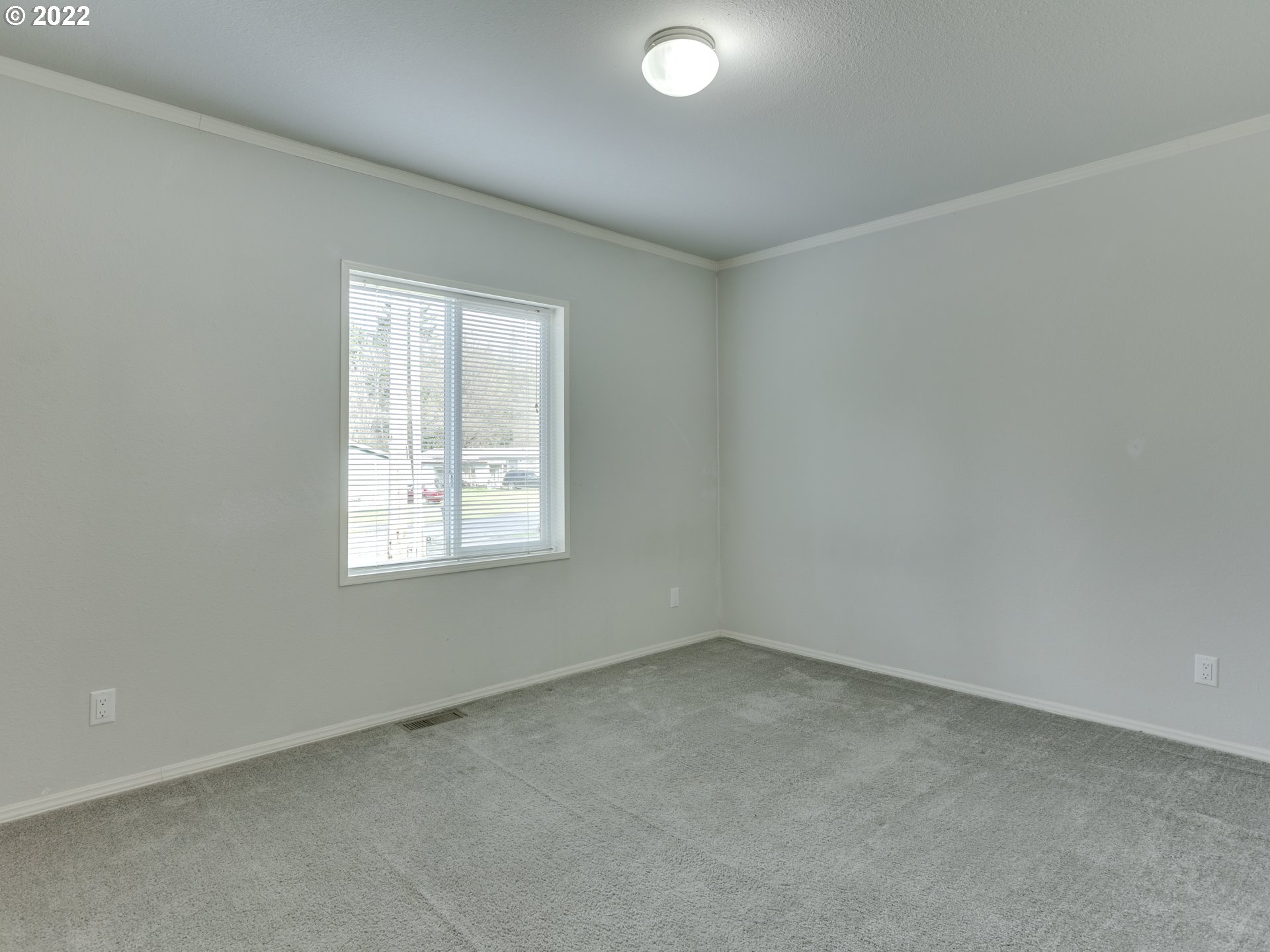 48 Southwest Ruckel Street Cascade Locks, OR 97014 - Photo 20 of 27 an empty room with a window