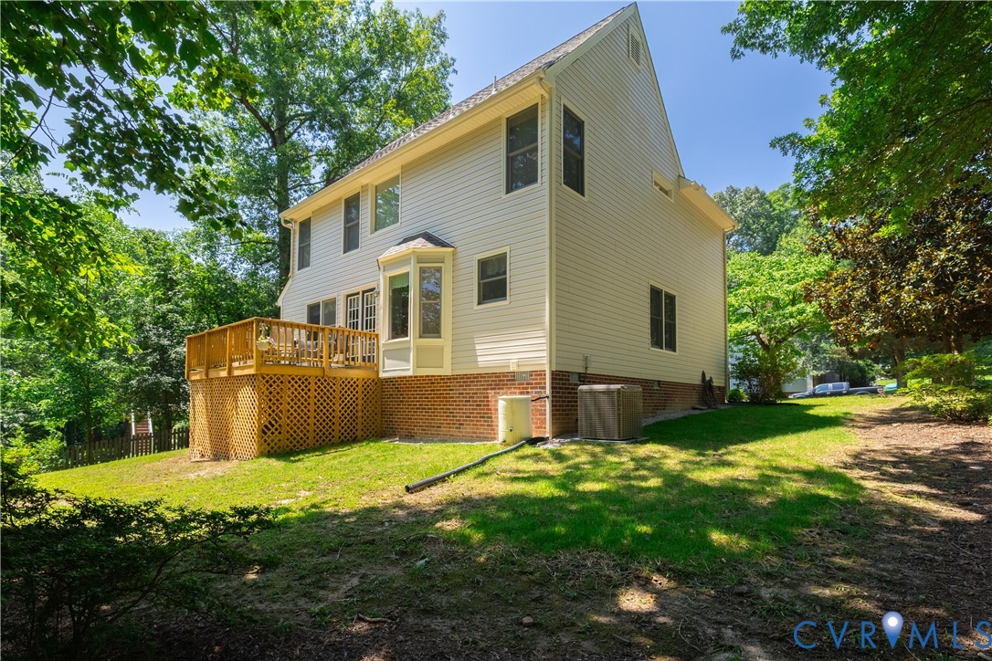4501 Foxwood Road Chester, VA 23831 - Photo 37 of 42 Rear exterior featuring a wooden deck with lattice