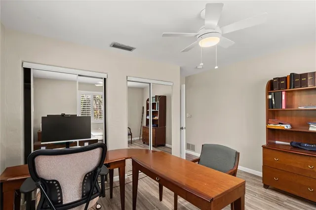 a view of a livingroom with furniture and a flat screen tv