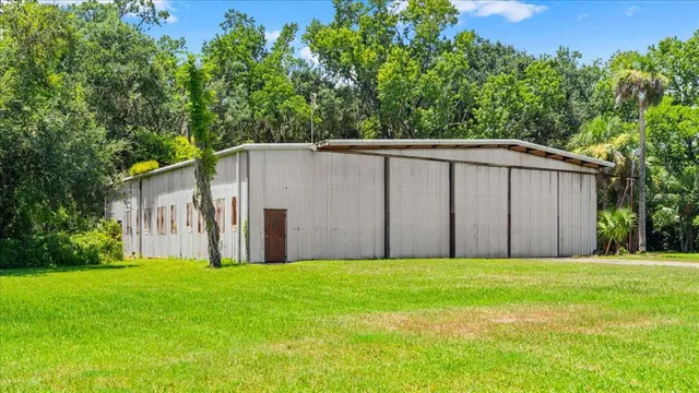 a view of a back yard of the house