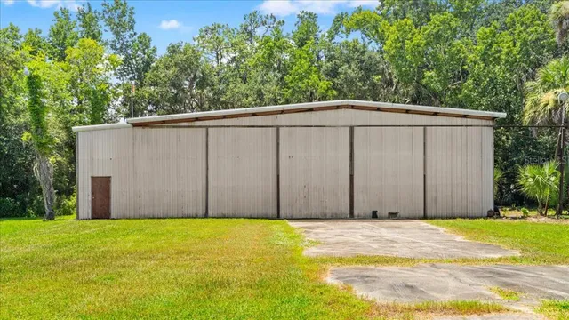 a view of a backyard of the house