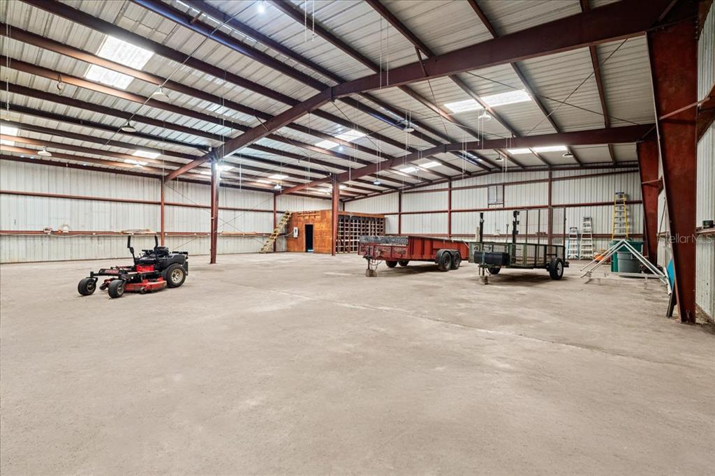 1020 Old Big Tree Road Daytona Beach, FL 32119 - Photo 33 of 37 a view of parking garage with cars