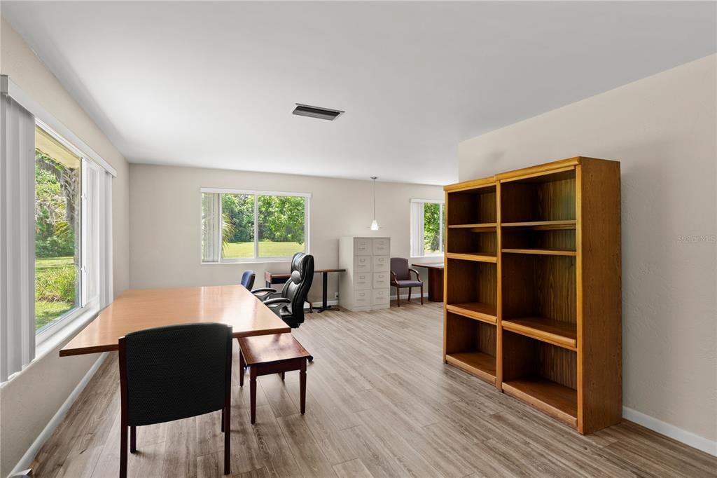 1020 Old Big Tree Road Daytona Beach, FL 32119 - Photo 5 of 37 a living room with furniture window and wooden floor
