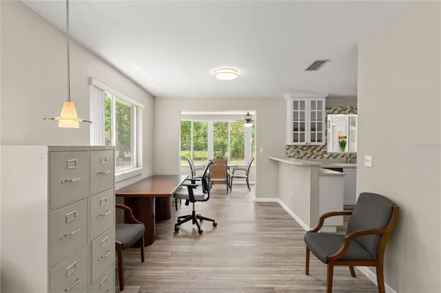 a living room with furniture and a table