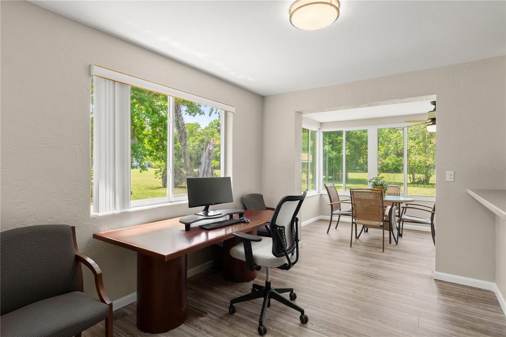 1020 Old Big Tree Road Daytona Beach, FL 32119 - Photo 10 of 37 a view of a workspace with furniture and a window