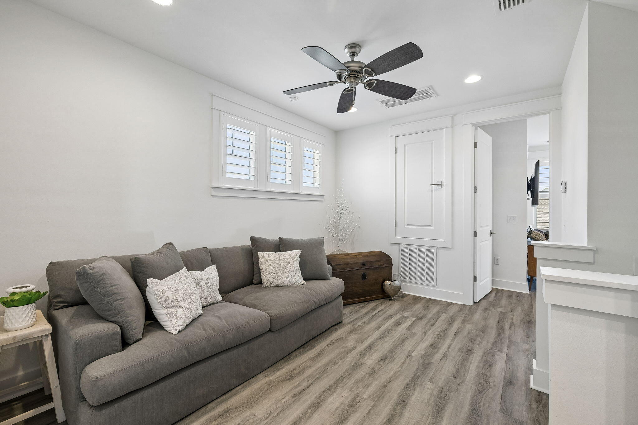 115 Log Landing St Inlet Beach Inlet Beach, FL 32461 - Photo 36 of 69 a living room with furniture and a wooden floor