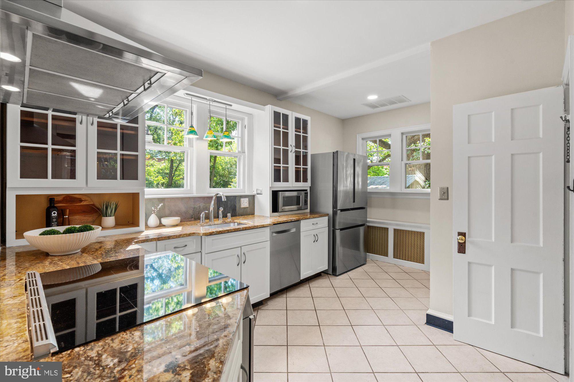 823 Bonifant Street Silver Spring, MD 20910 - Photo 14 of 42 Open and updated kitchen