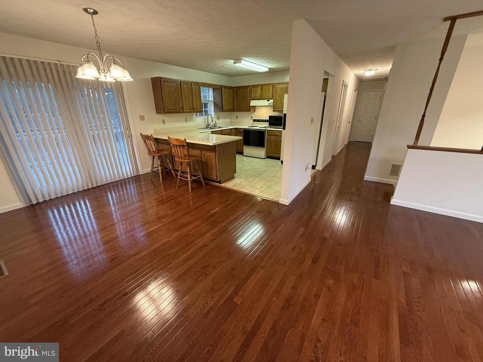 21 Coolidge Road Inwood, WV 25428 - Photo 28 of 80 Open-Concept Living, Dining & Kitchen Area