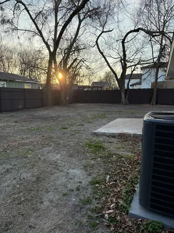 a view of a house with a trees