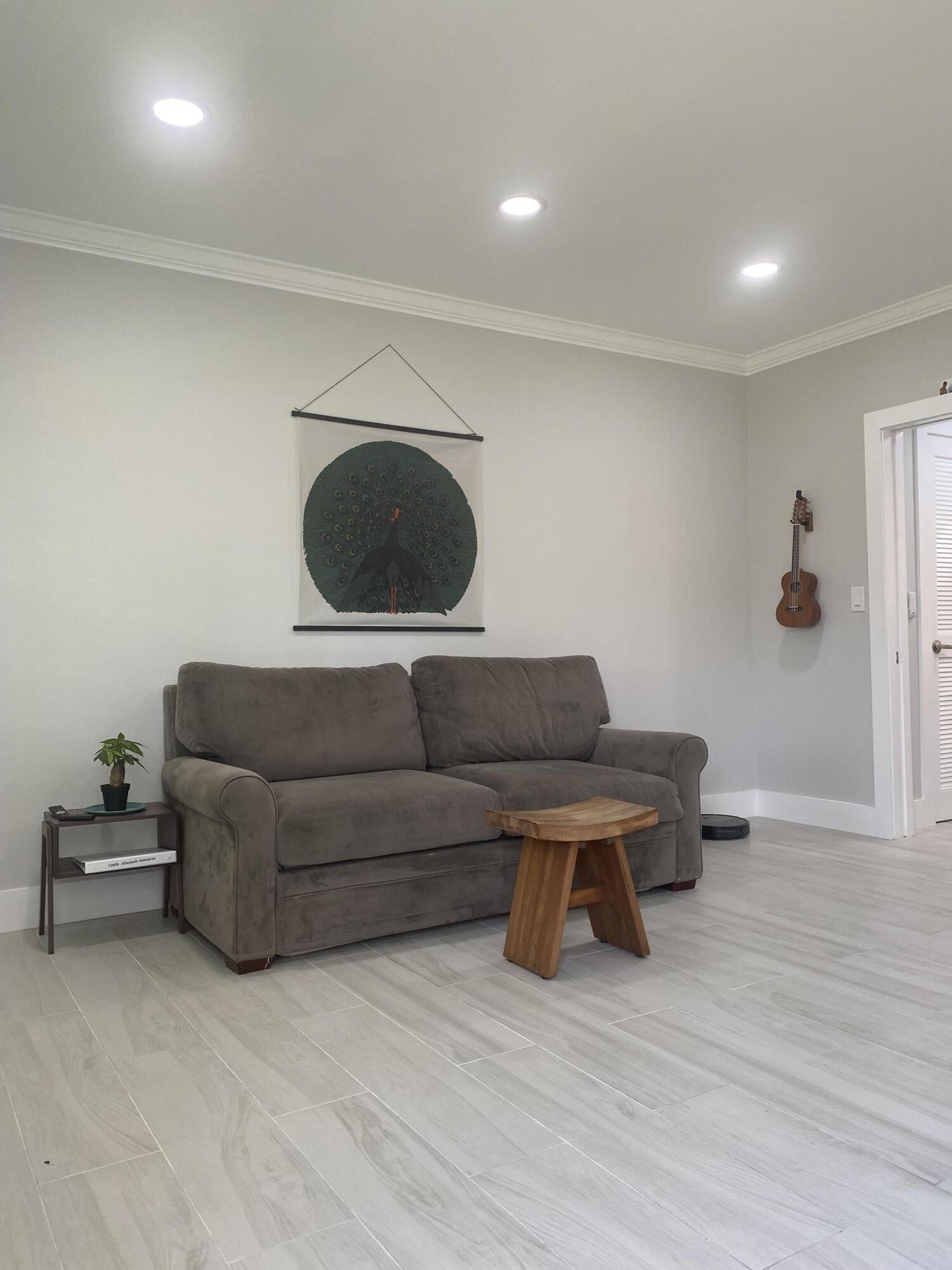 31 South Golfview Road, Unit 5 Lake Worth Beach, FL 33460 - Photo 11 of 11 a living room with furniture and a wooden floor