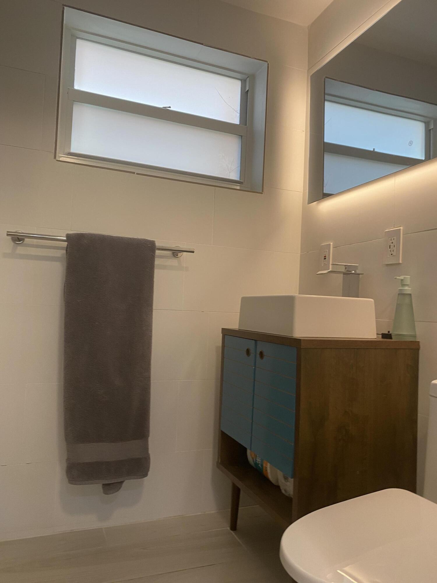 31 South Golfview Road, Unit 5 Lake Worth Beach, FL 33460 - Photo 5 of 11 a bathroom with a toilet