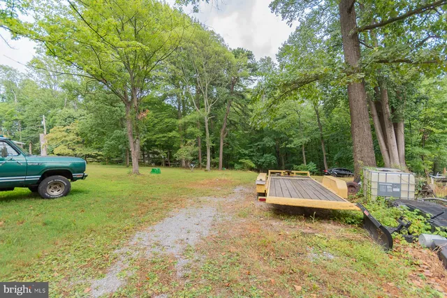 a fire hydrant in the middle of a field