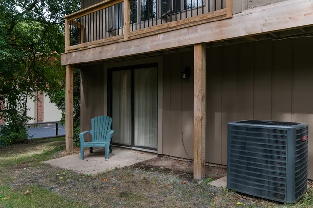 a view of a two chairs in the room