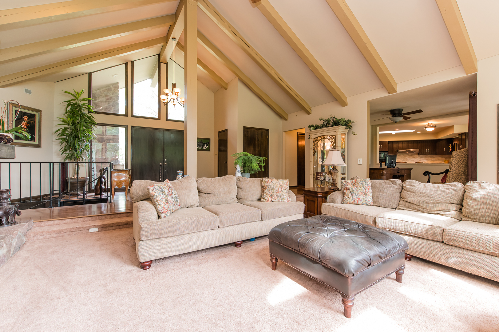 11-n060 Johnstoun Road Elgin, IL 60124 - Photo 18 of 44 a living room with furniture a large window and a chandelier
