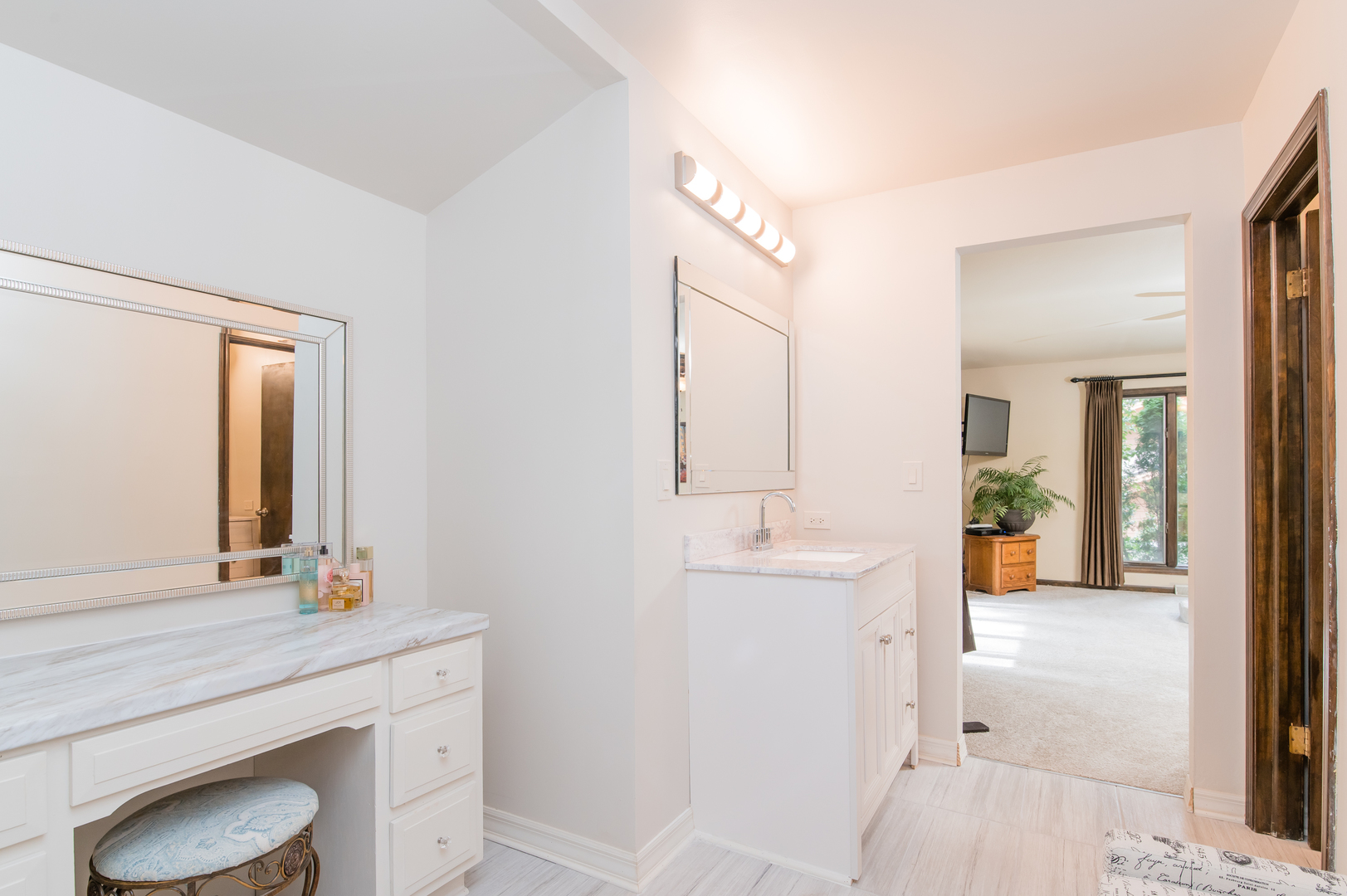 11-n060 Johnstoun Road Elgin, IL 60124 - Photo 29 of 44 a bathroom with a sink a toilet and shower