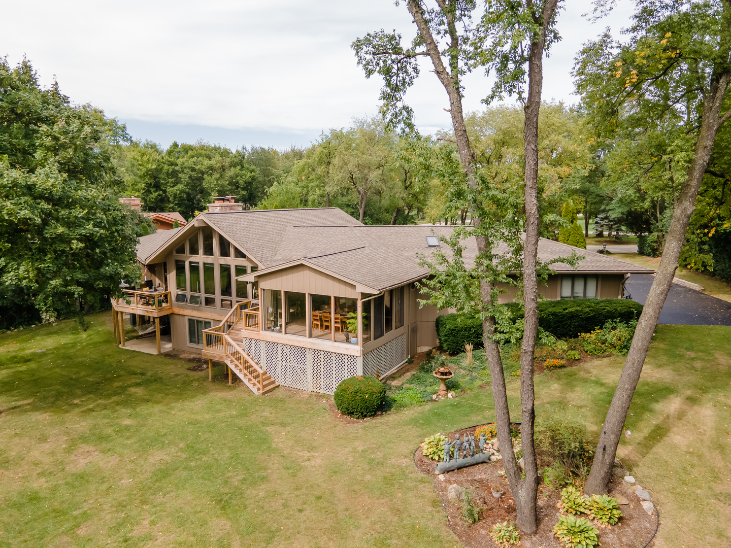 11-n060 Johnstoun Road Elgin, IL 60124 - Photo 4 of 44 aerial view of a house with a big yard and large trees