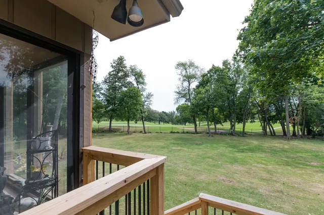 a view of a porch with a backyard
