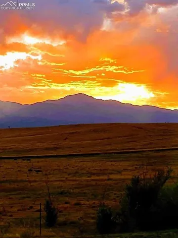 a view of a lake with a mountain