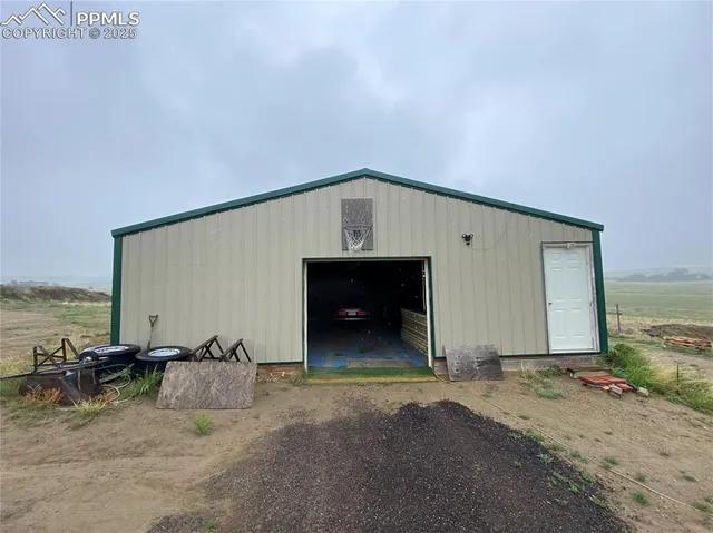 a view of a terrace with a garden