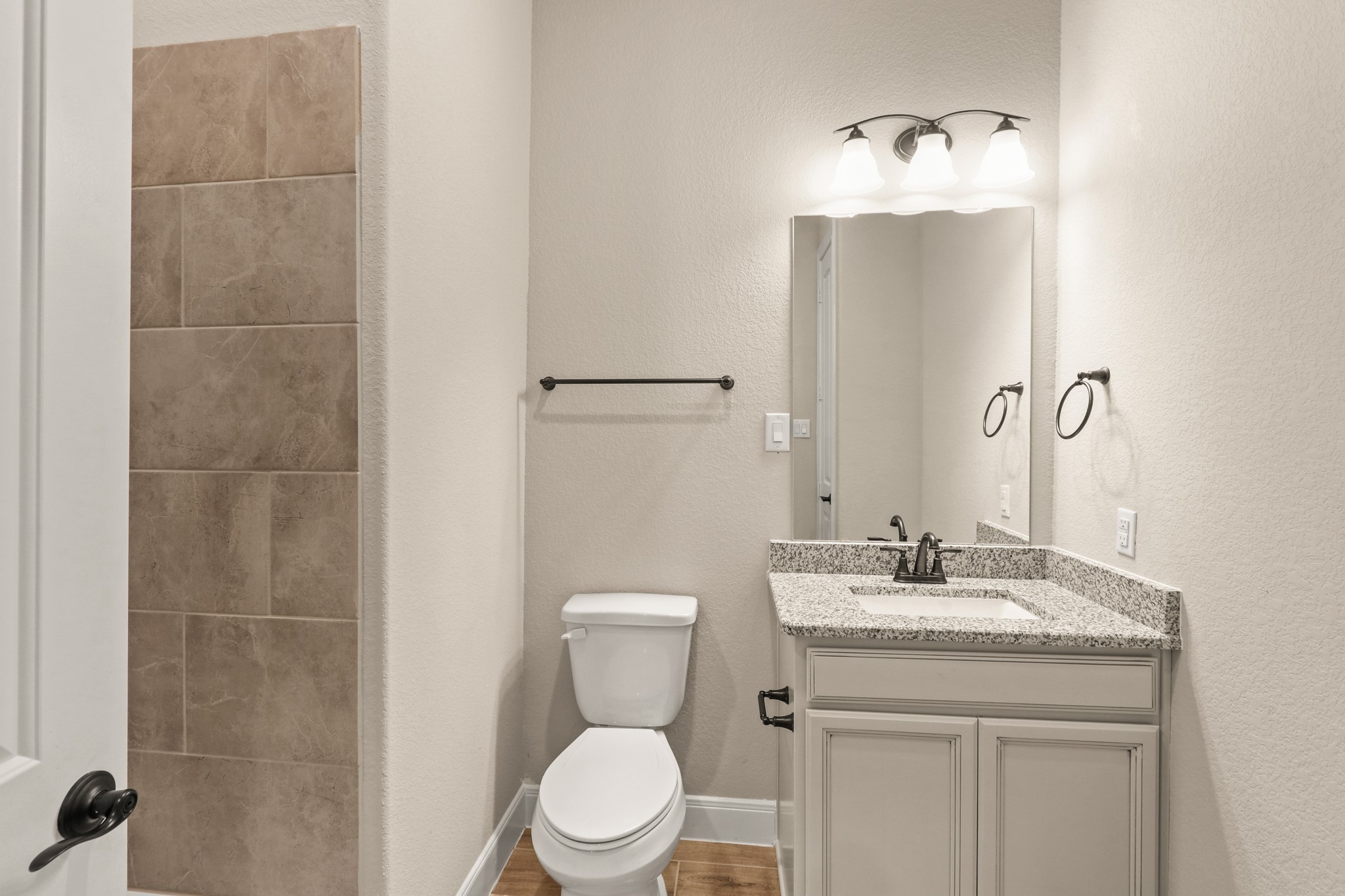 9510 Turnstone Drive Manvel, TX 77578 - Photo 15 of 19 The secondary bathroom is stylishly appointed and thoughtfully designed for comfort and convenience.