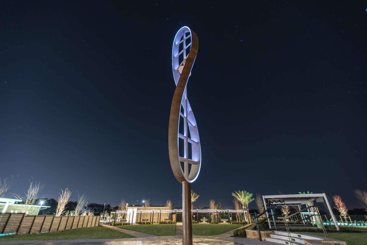 9510 Turnstone Drive Manvel, TX 77578 - Photo 18 of 19 The views at night from the neighborhood amenities are breathtaking.