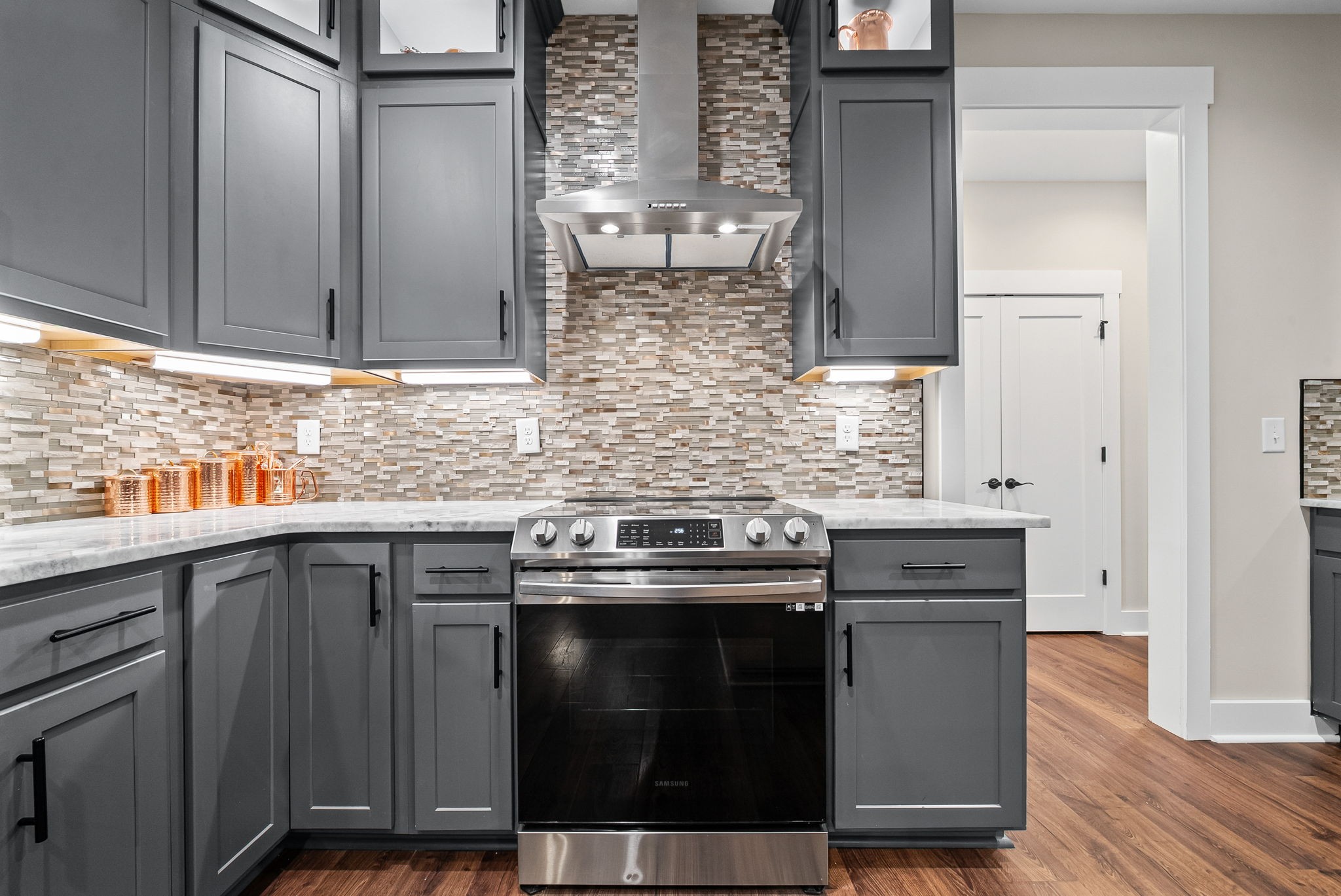 2854 Benton Ridge Road Palmyra, TN 37142 - Photo 19 of 64 a kitchen with stainless steel appliances granite countertop a sink and a stove