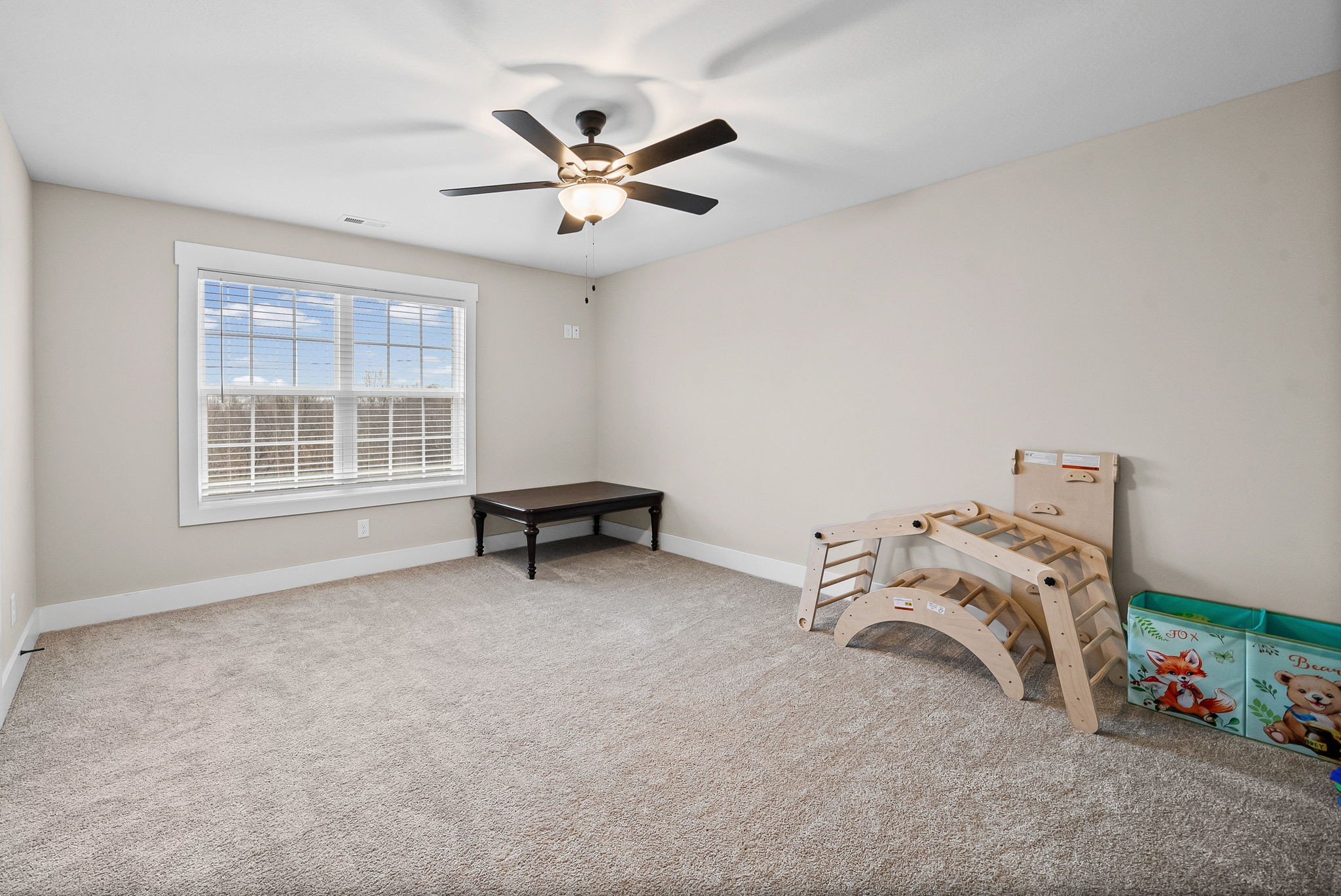 2854 Benton Ridge Road Palmyra, TN 37142 - Photo 39 of 64 a view of a livingroom with furniture and a ceiling fan