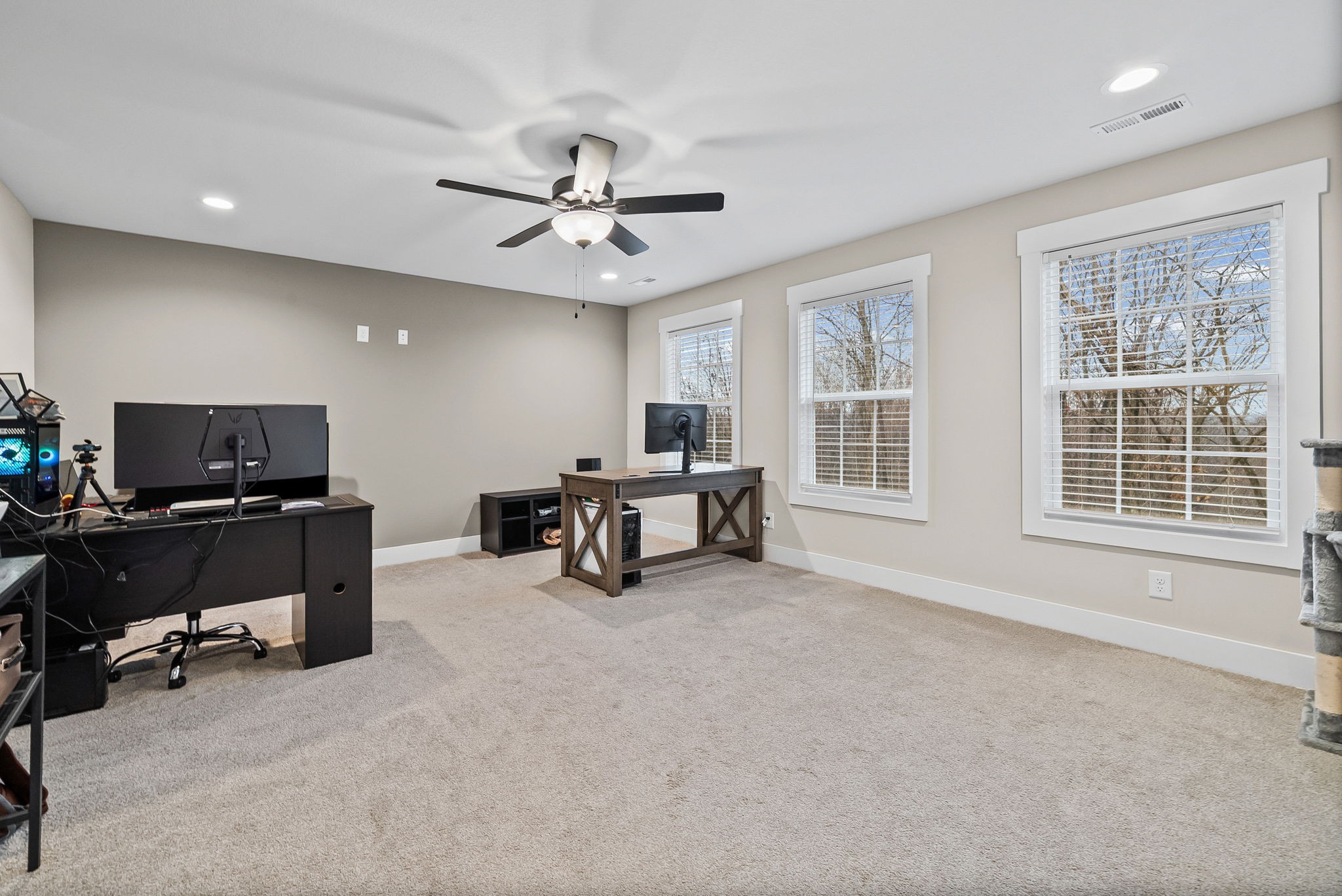 2854 Benton Ridge Road Palmyra, TN 37142 - Photo 44 of 64 a living room with furniture and a flat screen tv