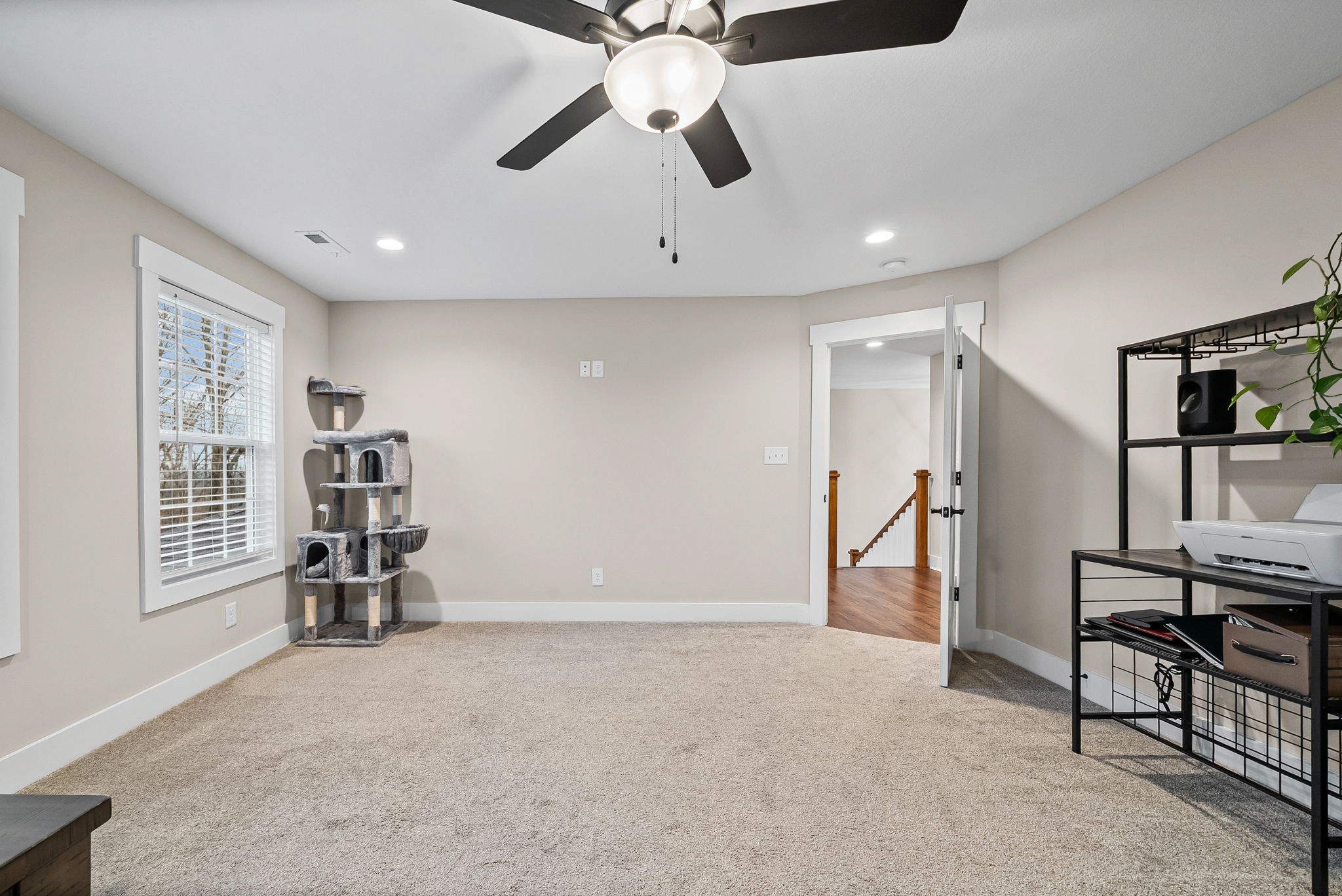 2854 Benton Ridge Road Palmyra, TN 37142 - Photo 45 of 64 a view of a livingroom with furniture and a ceiling fan