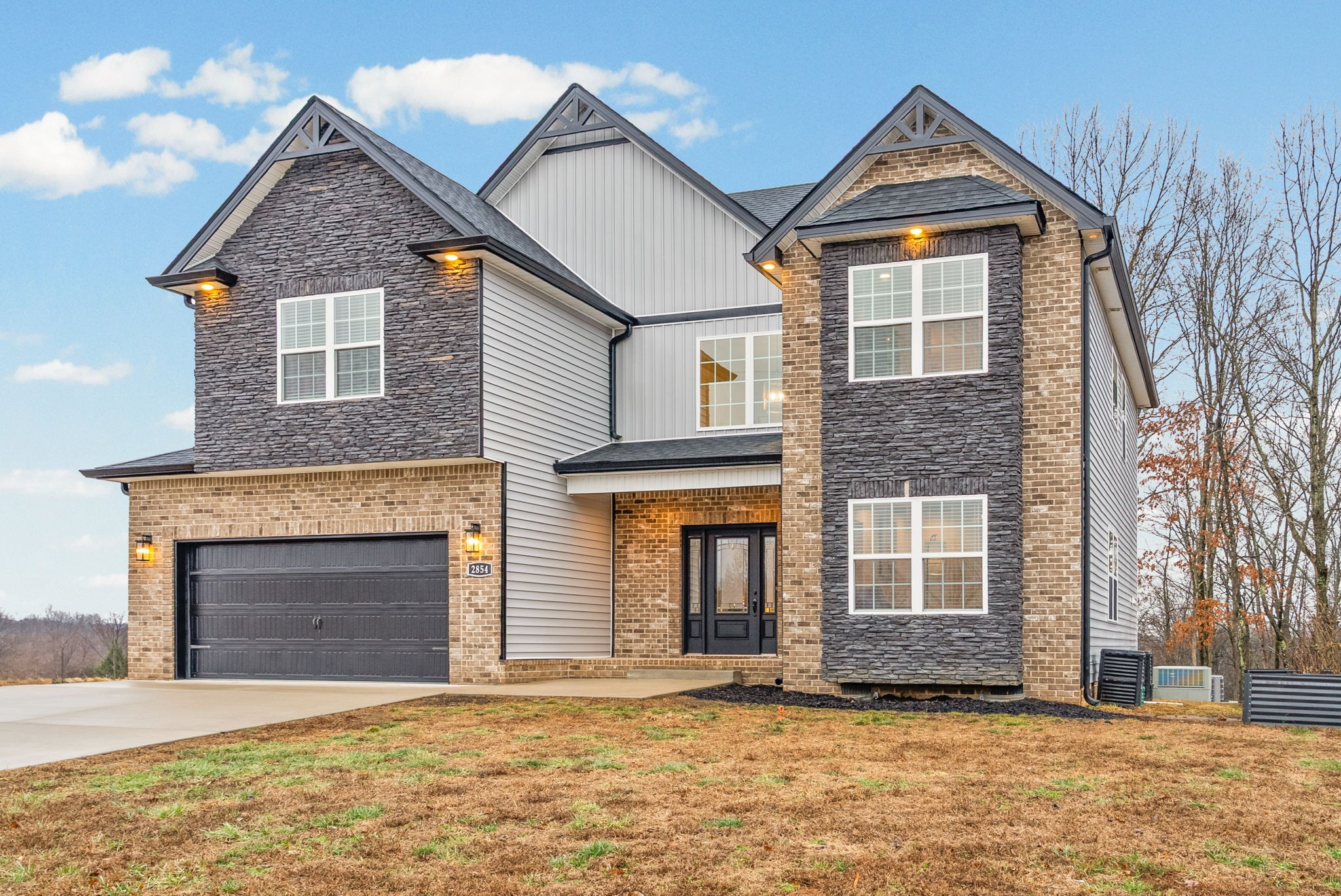 2854 Benton Ridge Road Palmyra, TN 37142 - Photo 61 of 64 a front view of a house with a yard