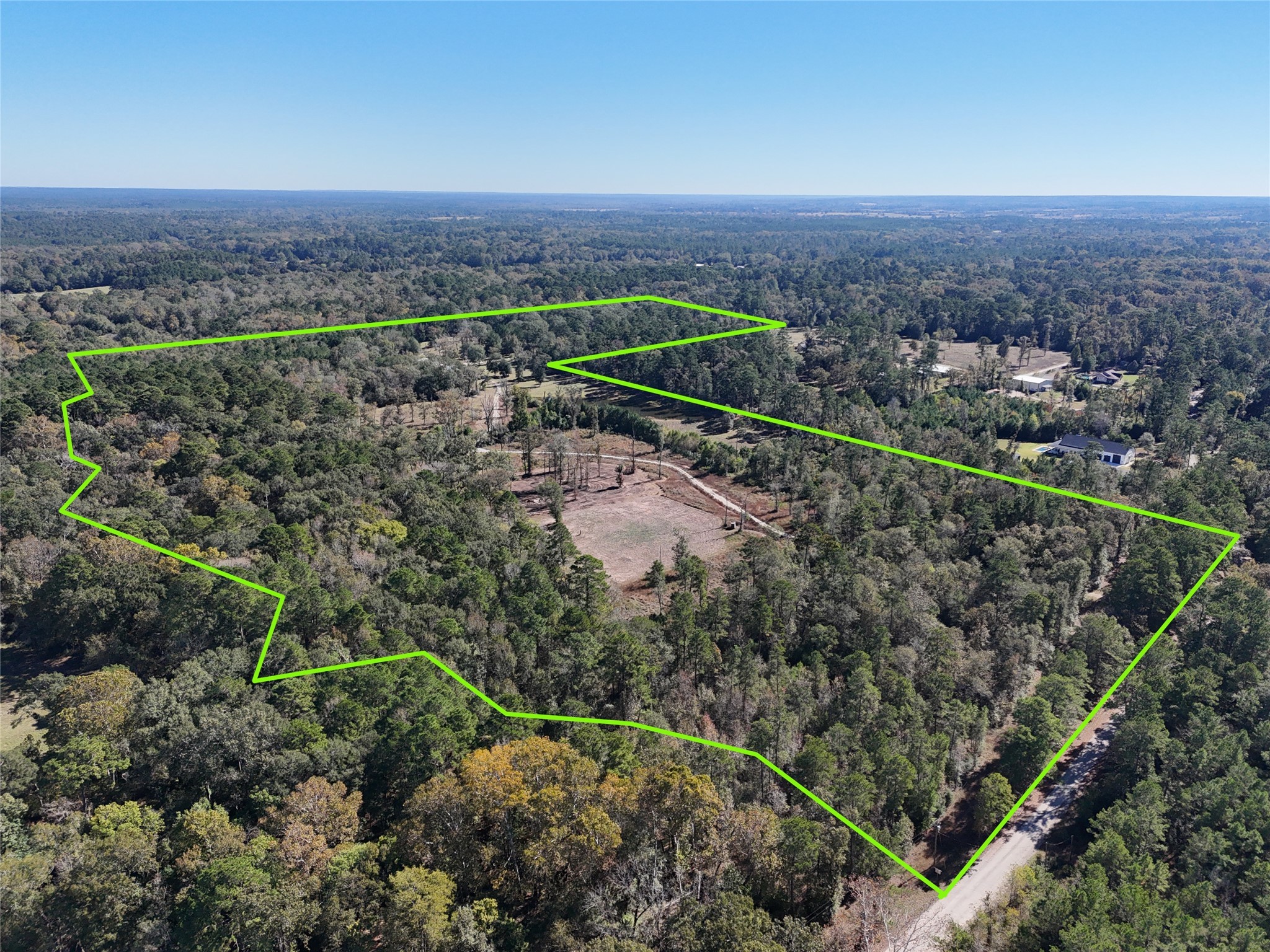 64 Gourd Creek Cemetary Road Huntsville, TX 77340 - Photo 1 of 34 a view of a city with a mountain
