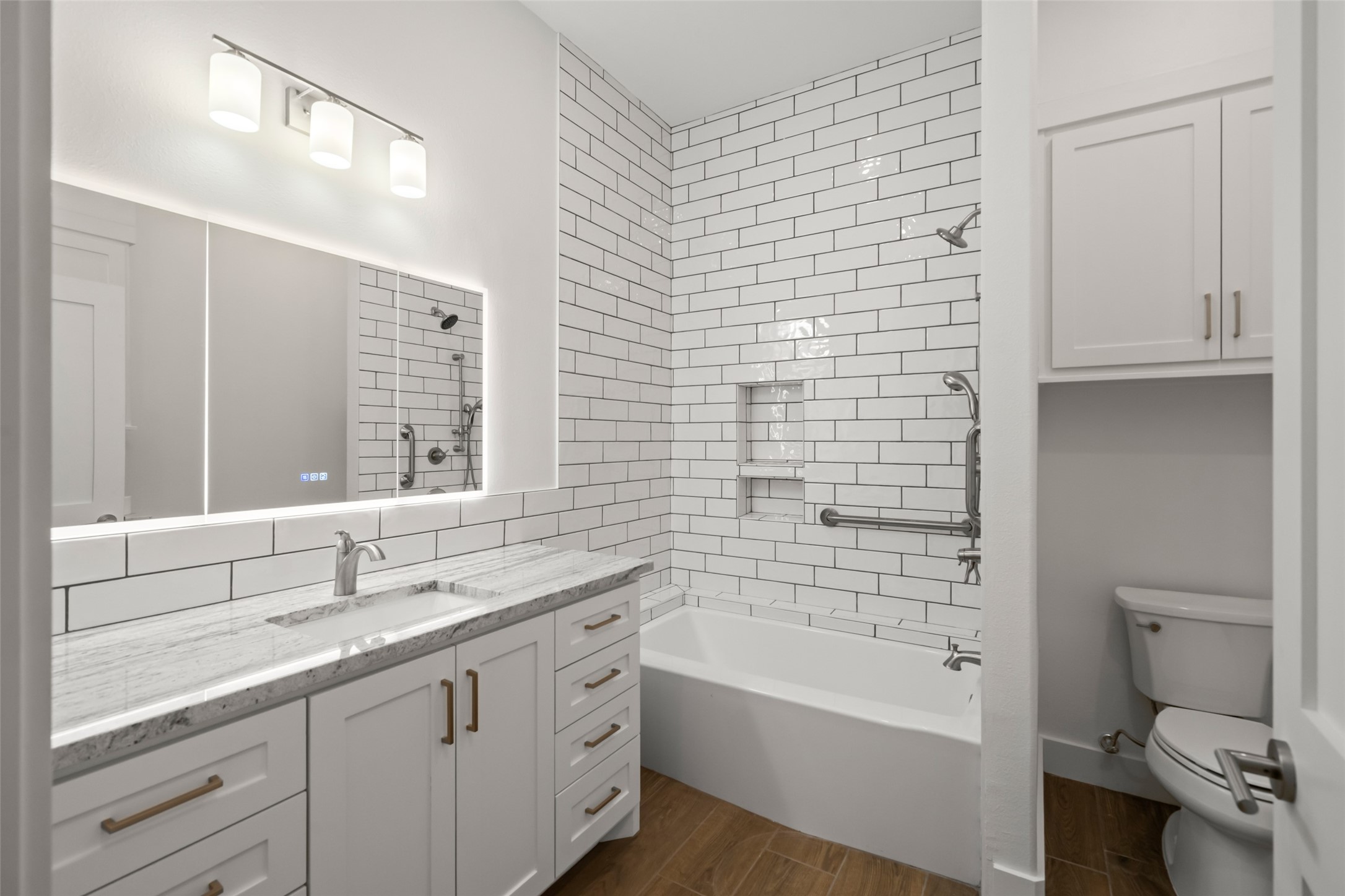 64 Gourd Creek Cemetary Road Huntsville, TX 77340 - Photo 12 of 34 a bathroom with a bathtub sink vanity mirror and toilet