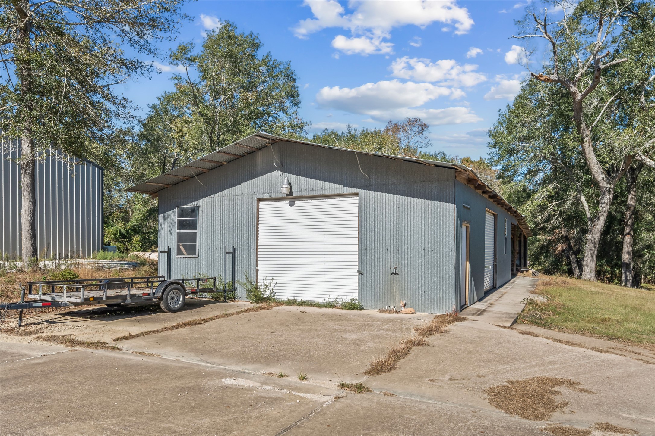 64 Gourd Creek Cemetary Road Huntsville, TX 77340 - Photo 21 of 34 a car parked in front of house