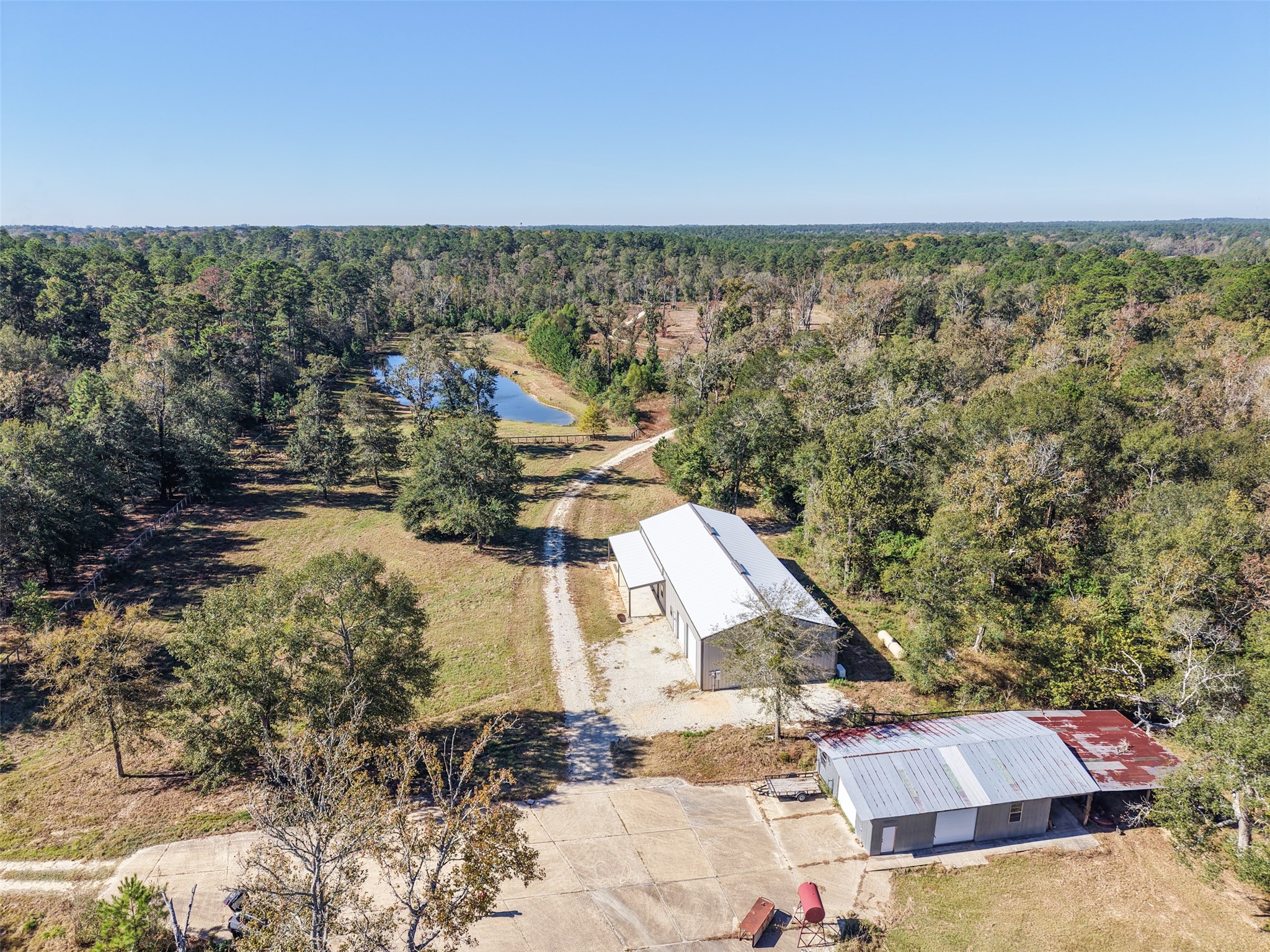 64 Gourd Creek Cemetary Road Huntsville, TX 77340 - Photo 5 of 34 a view of a city