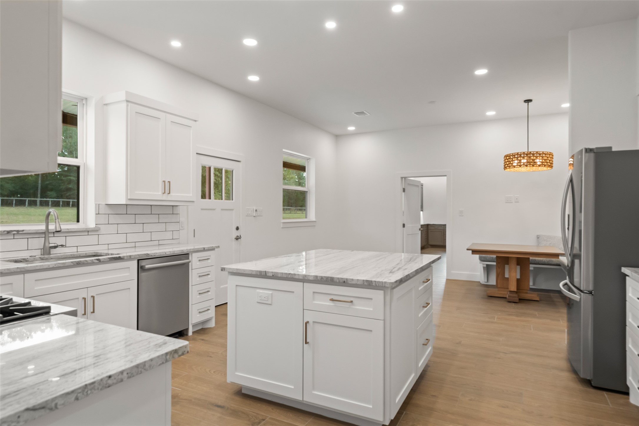 64 Gourd Creek Cemetary Road Huntsville, TX 77340 - Photo 9 of 34 a kitchen with a sink stove and refrigerator