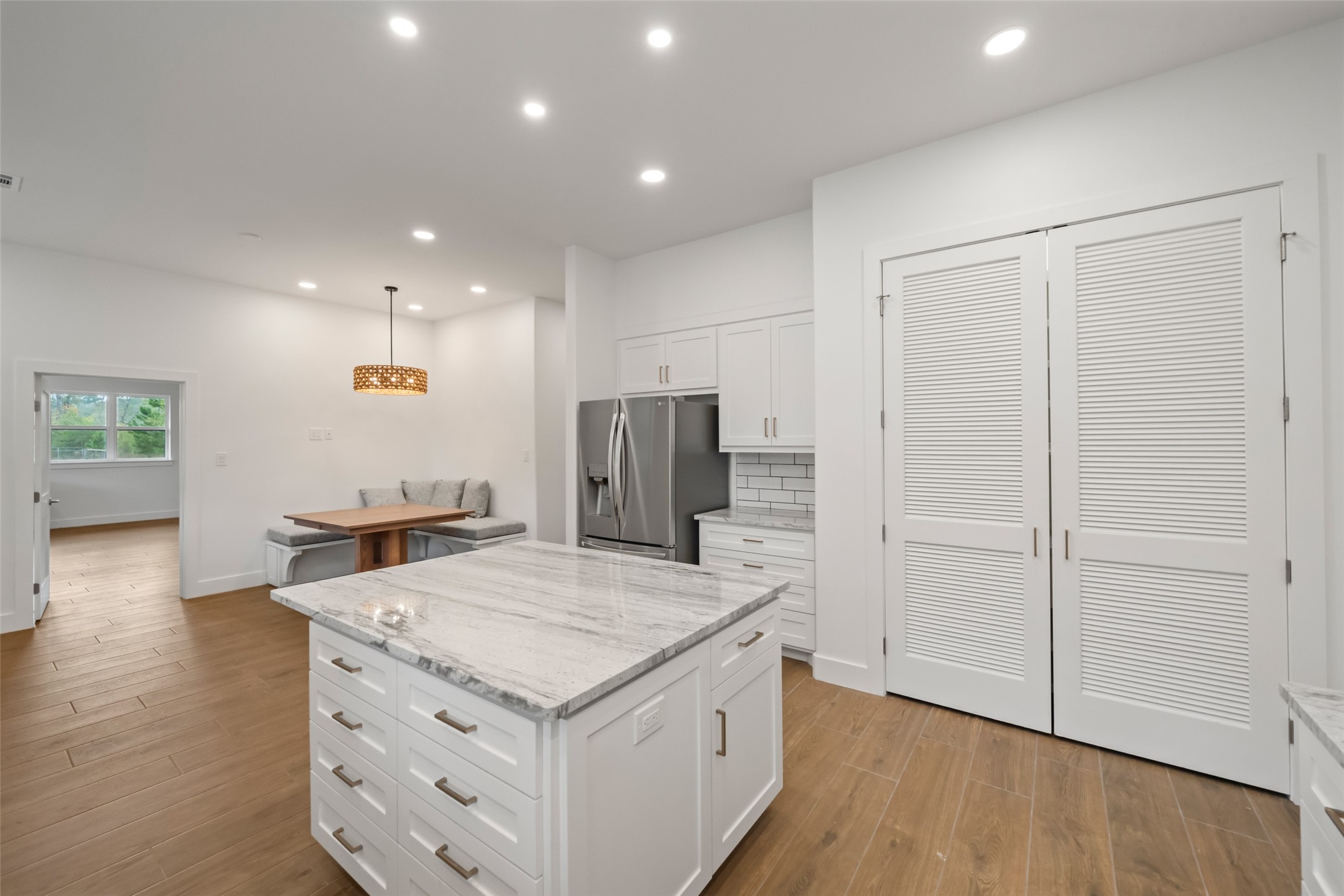 64 Gourd Creek Cemetary Road Huntsville, TX 77340 - Photo 10 of 34 a kitchen with a sink and refrigerator